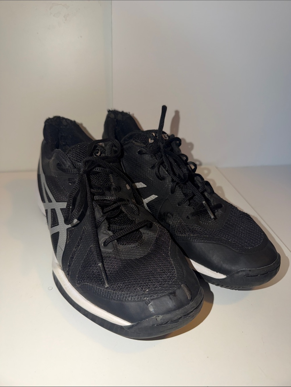 Asics Black Athletic Sneakers with White Logo Accents